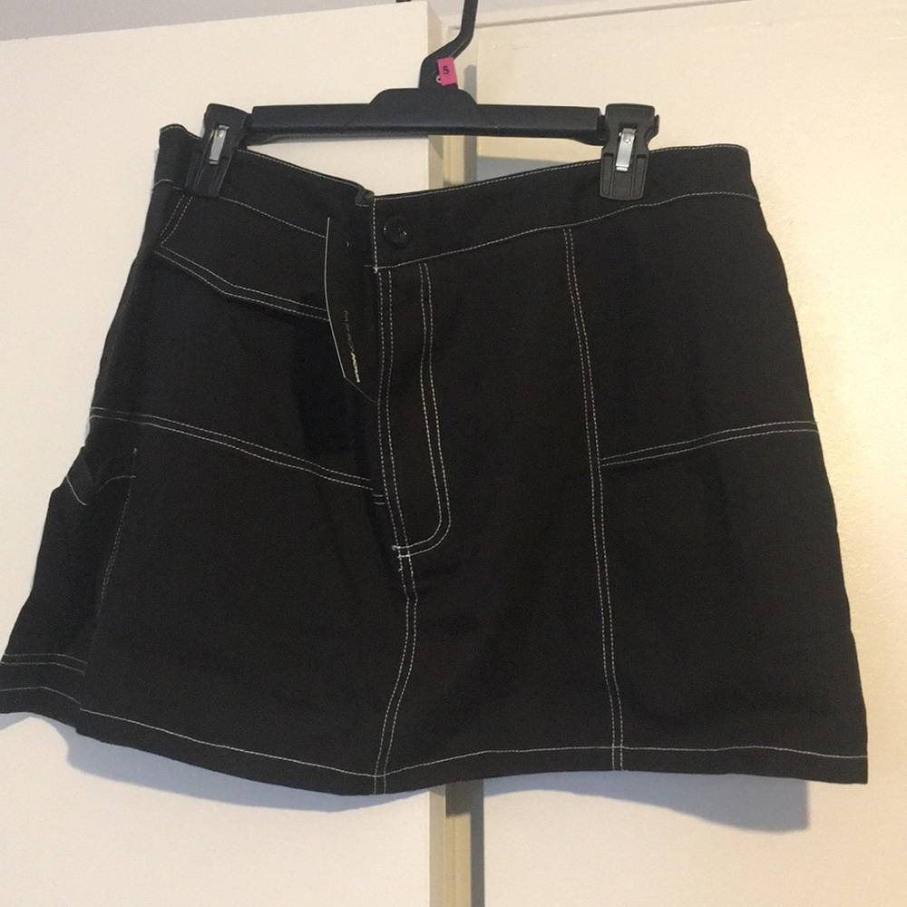 Fashion Nova Mini Skirt with 2 pockets.